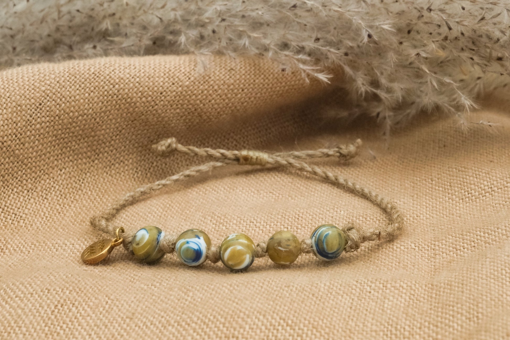 Bracelet with recycled plastic beads on handtwisted jute string –  Hippie-Trail